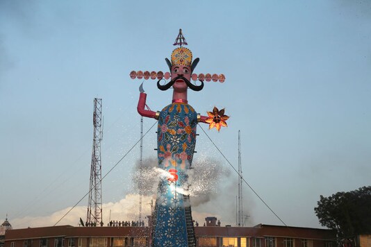 An effigy of demon king Ravana is lit to be burnt marking the end of Dussehra festival. Image for representation. (Image: AP) An effigy of demon king Ravana is lit to be burnt marking the end of Dussehra festival. Image for representation. (Image: AP)