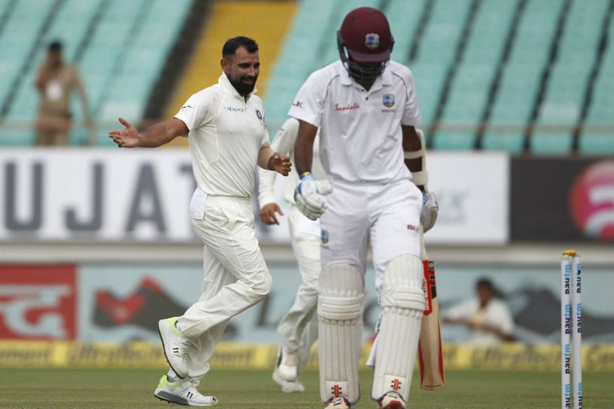 In Pics | India vs West Indies, First Test, Day 2 at Rajkot In Pics | India vs West Indies, First Test, Day 2 at Rajkot