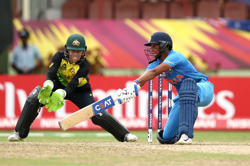 Harmanpreet Kaur (27-ball 43) added 68 runs with Mandhana.