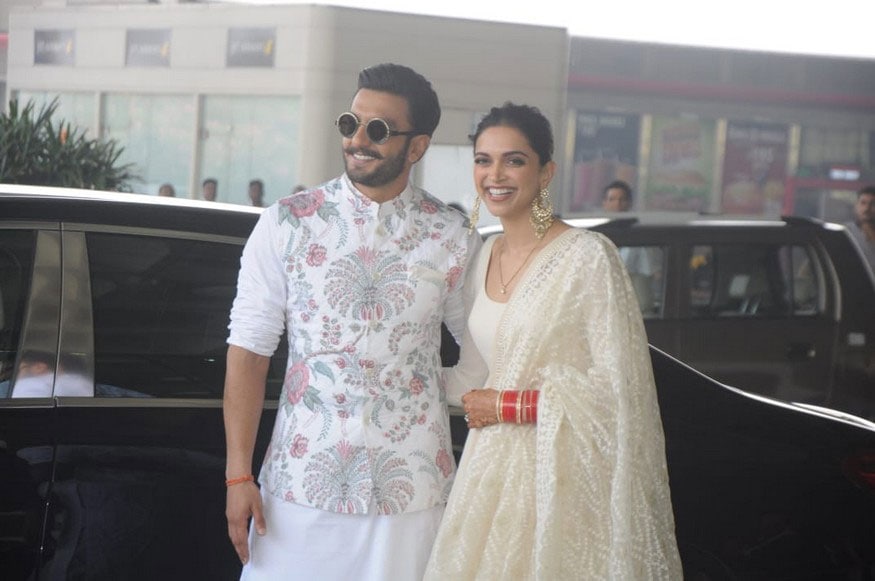 Deepika Padukone, Ranveer Singh wedding reception: Couple goes regal in  white and gold colour coordinated ensemble-Entertainment News , Firstpost