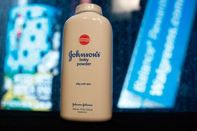 A bottle of Johnson and Johnson Baby Powder is seen in a photo illustration.  (Reuters)