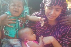 The wife of Omor Ali, a worker who is trapped inside the coal mine, wants to see her husband one last time.