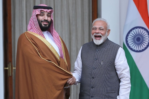 File photo of PM Narendra Modi with Saudi Crown Prince Mohammed bin Salman in New Delhi. (Image: AP)