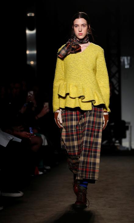 A model presents a creation by Alexandra Moura during the Milan Fashion Week in Milan, Italy, February 25, 2019. REUTERS/Alessandro Garofalo