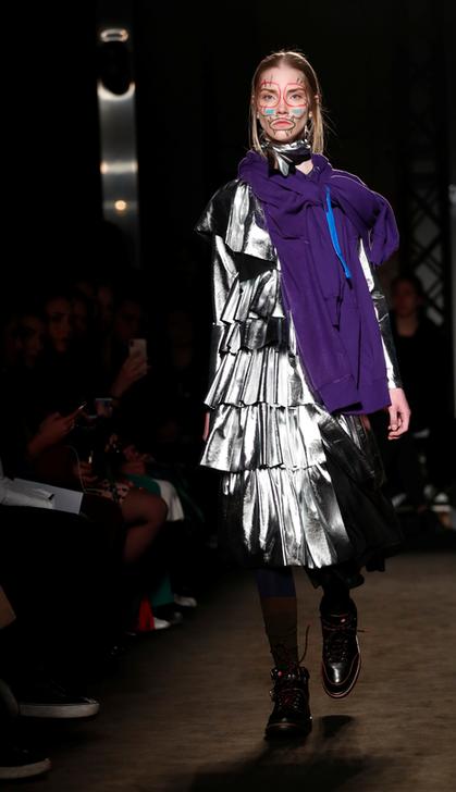 A model presents a creation by Alexandra Moura during the Milan Fashion Week in Milan, Italy, February 25, 2019. REUTERS/Alessandro Garofalo