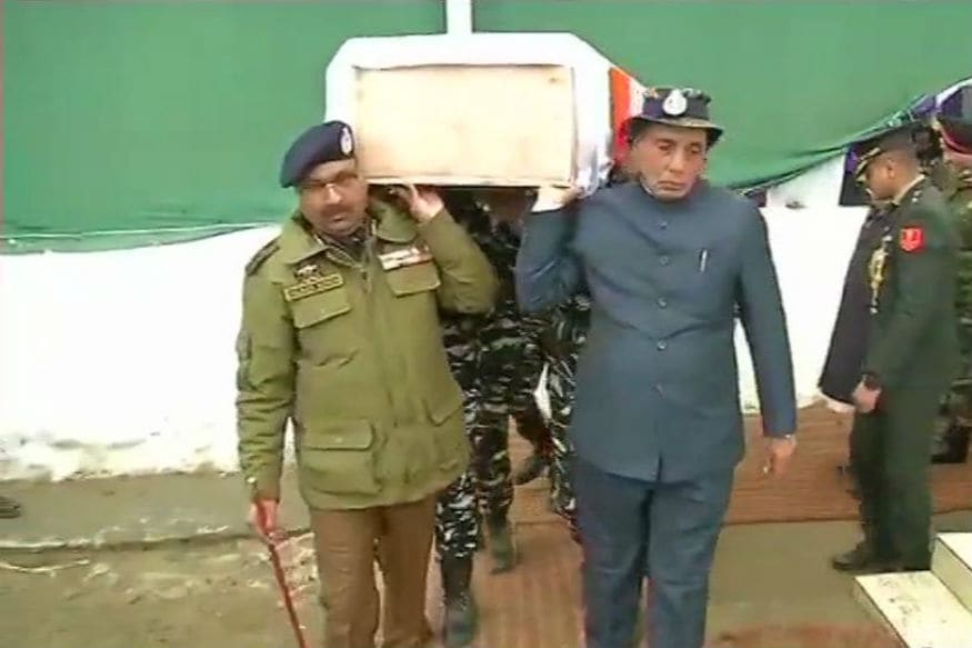 Rajnath Singh, J&K DGP Dilgabh Singh Carry Coffin of Soldier Killed in Pulwama Terror Strike​