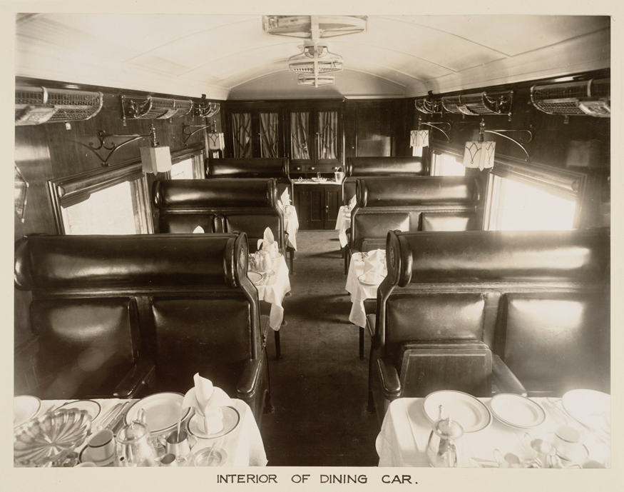 Inside a Great Indian Peninsula Railway dining car, probably first class. At this time long-distance trains had dining cars, but some shorter journeys did not have dining facilities. Trains stopped at certain stations for passengers to visit refreshment rooms. The food served in the dining cars was British rather than Indian, as the British were in control of India at this time. (Image: Getty Images)