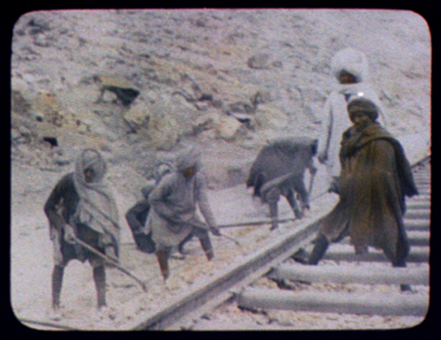 Hand-coloured photograph of Indian workers building railway lines. (Image: Getty Images)