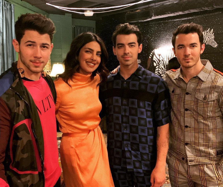  Priyanka Chopra is flanked by Nick Jonas and his brothers. (Image: Instagram)