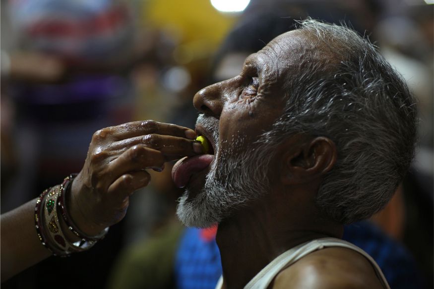 Annual Fish Prasadam in Hyderabad Thousands Swallow Live Fish to Cure