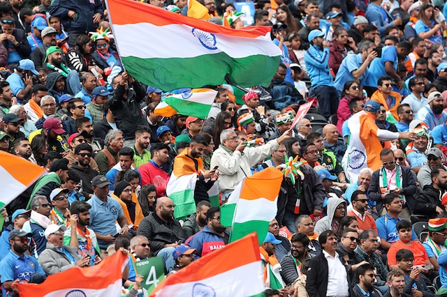 Indian fans cheer for their team during the Cricket World Cup match between India and Pakistan at Old Trafford in Manchester, England. (Image: AP)