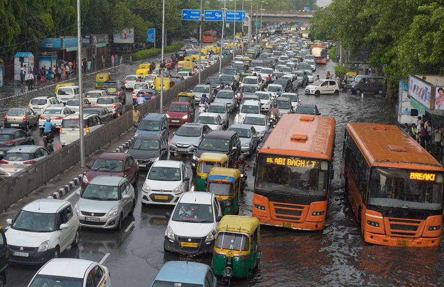 Traffic congestion due to waterlogging, following heavy monsoon rain at ITO in New Delhi. (Image: PTI)