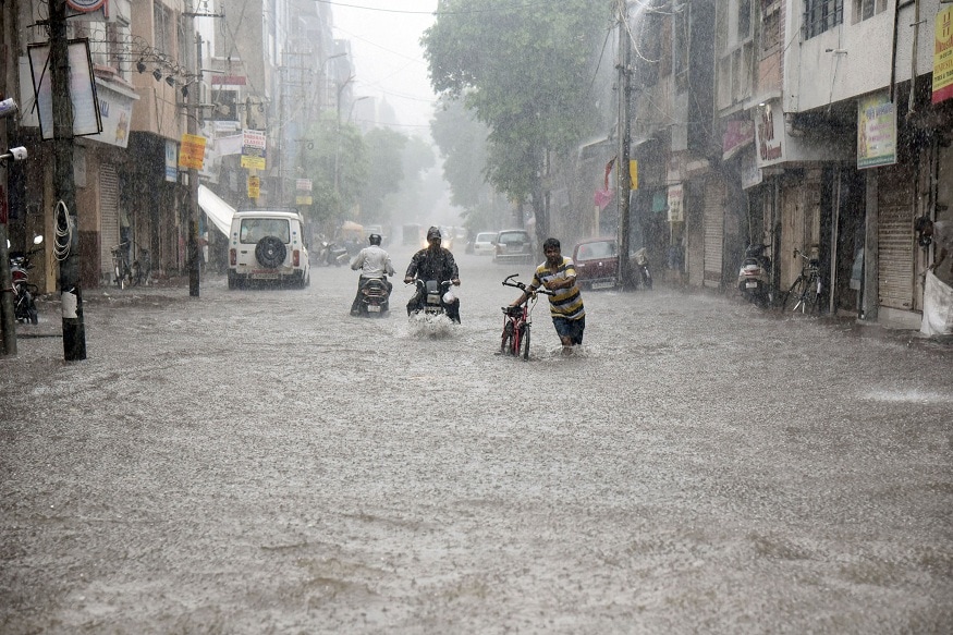 Photos Heavy Rains Lead To Flash Floods In Vadodara Gujarat News18