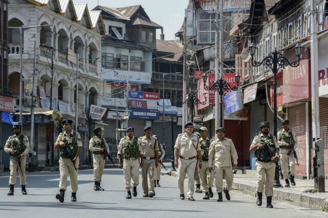 Srinagar: Security personnel patrol a deserted street on the 33rd day of strike and restrictions imposed after the abrogration of Article of 370 and bifurcation of state, in Srinagar. (PTI Photo) 