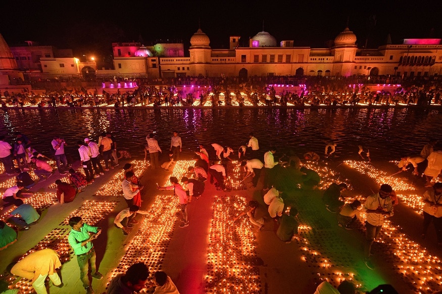 Kartik Purnima: Devotees Take Holy Dip Amid High Security in Ayodhya - News18
