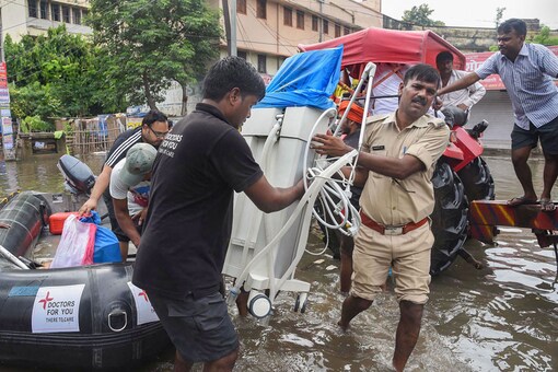 In this representational image, police personnel carry a medical ventilator machine in Patna. (PTI/File photo)