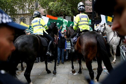 Pakistani demonstrators protest against the scrapping of Article 370 by the Indian government, outside the Indian High Commission in London on August 15. (Reuters)
