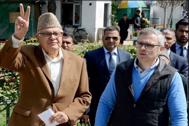 File photo of National Conference president Farooq Abdullah (L) and his son Omar Abdullah. 