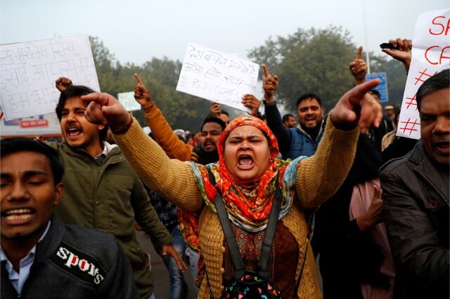 Demonstrators take part in a protest against a new citizenship law, in Delhi. (Image: Reuters)