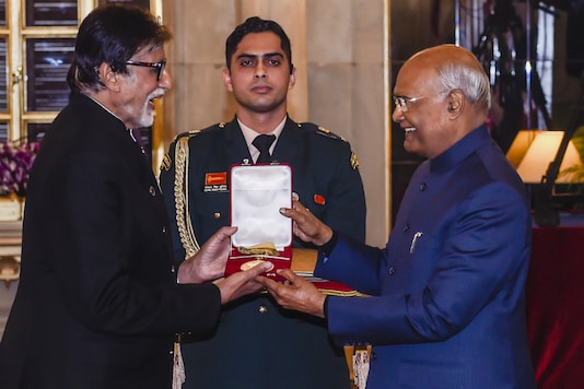 President Ram Nath Kovind presents the Dada Saheb Phalke Award for the year 2018 to veteran Bollywood actor Amitabh Bachchan, conferred for his contribution to the Indian film industry, at Rashtrapati Bhawan in New Delhi on Sunday (PTI) President Ram Nath Kovind presents the Dada Saheb Phalke Award for the year 2018 to veteran Bollywood actor Amitabh Bachchan, conferred for his contribution to the Indian film industry, at Rashtrapati Bhawan in New Delhi on Sunday (PTI)