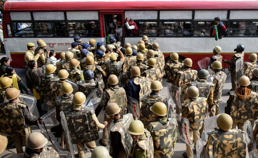 Police personnel  detain Samajwadi Party workers during a protest against Citizenship (Amendment) Act, in Prayagraj(Allahabad). (Image: PTI)