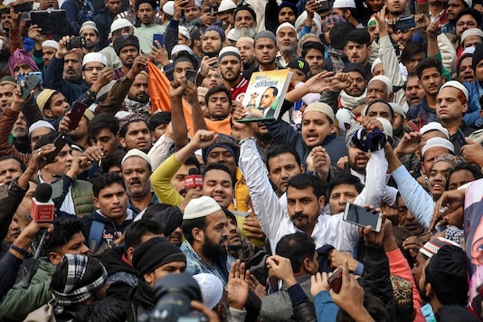 Bhim Army chief Chandrashekhar Azad and others hold a demonstration against the CAA at Jama Masjid after Friday prayers on December 20, 2019. (Image: PTI) Bhim Army chief Chandrashekhar Azad and others hold a demonstration against the CAA at Jama Masjid after Friday prayers on December 20, 2019. (Image: PTI)