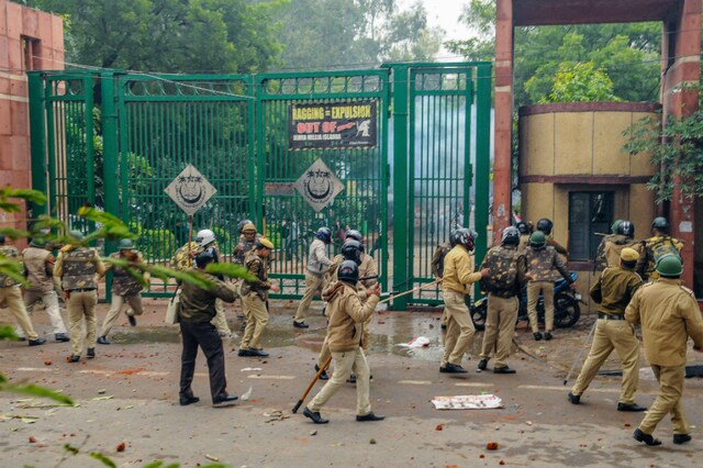 File photo: Police personnel outside the Jamia Millia Islamia University as students  stage a protest against the passing of Citizenship Amendment Bill, in New Delhi, Friday, Dec. 13, 2019. (PTI)