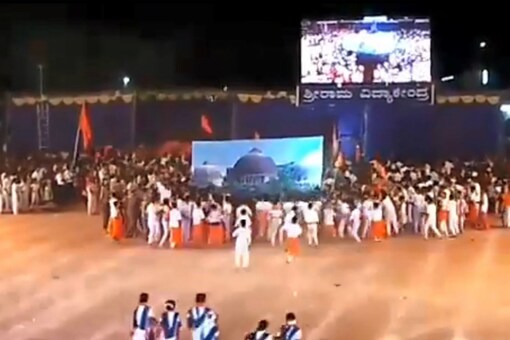 The video shows a bunch of children dressed in white and saffron rushing towards the huge Babri Masjid poster amid chants of ‘Shree Ram Chandra Ki Jai’ . 