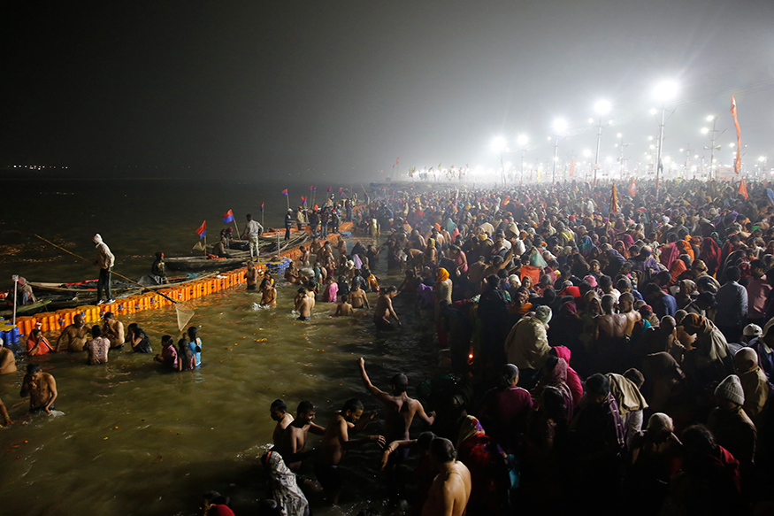 Up Cm Yogi Flies Kites Takes Holy Dip At Sangam On Basant Panchami 