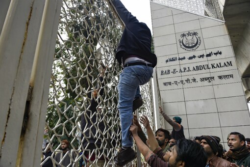 Jamia Milia Islamia University students protest against their Vice Chancellor (VC) Najma Akhtar, demanding registration of an FIR against Delhi Police in connection with last month's violence inside the campus in New Delhi on Monday. (PTI)