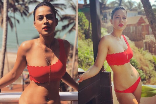Nia Sharma Begins Her New Year with a Dip in the Pool in Red Bikini,  Pictures Go Viral