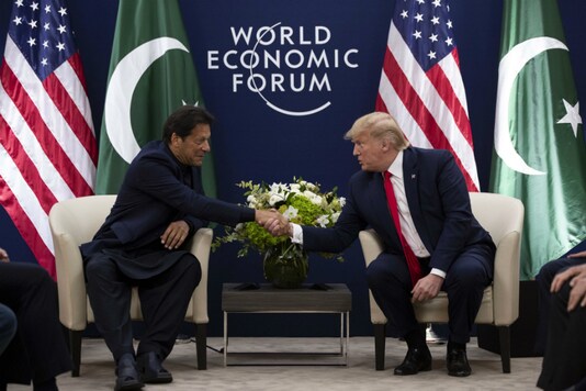 File photo of Pakistan PM Imran Khan with US President Donald Trump in Davos on Tuesday. (Photo: PTI)