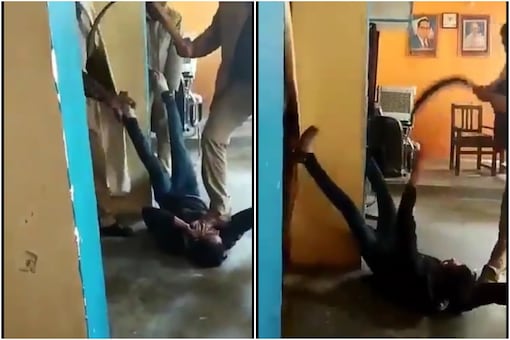 The video shows two policemen holding legs of a man while third policeman is seen beating the man and putting his shoe on the accused's face. (News18)
