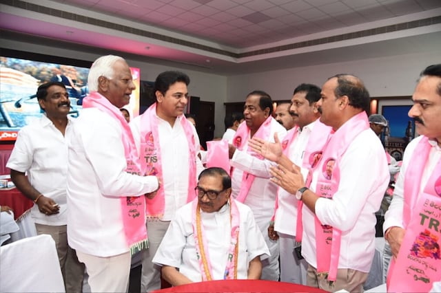State Minister KT Rama Rao discusses the election result trends with party leaders in Hyderabad on Saturday. (News18)