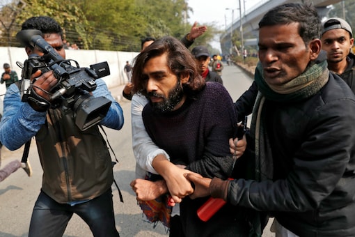 Shadab, a journalism student who received a bullet injury on his arm, was taken to the Holy Family Hospital for medical care. (Image: Reuters)