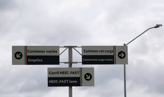 Direction signs for trucks are seen at a border customs control to cross into U.S. at the World Trade Bridge in Nuevo Laredo, Mexico June 5, 2019. REUTERS/Carlos Jasso/File Photo
Direction signs for trucks are seen at a border customs control to cross into U.S. at the World Trade Bridge in Nuevo Laredo, Mexico June 5, 2019. REUTERS/Carlos Jasso/File Photo