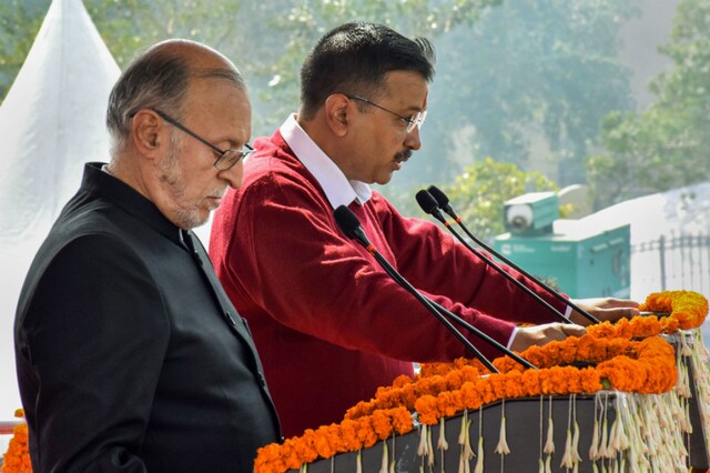 Arvind Kejriwal being sworn in as the Chief Minister of Delhi by Lt Governor Anil Baijal in New Delhi on Sunday. (PTI)