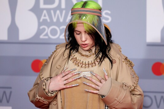 Billie Eilish poses for photographers at the Brit Awards 2020 in London. (Image: AP) Billie Eilish poses for photographers at the Brit Awards 2020 in London. (Image: AP)
