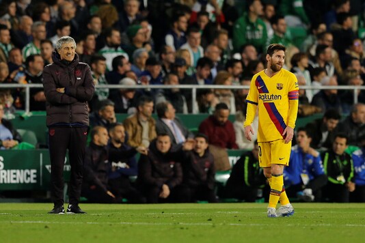 Quique Setian (L) and Lionel Messi (Photo Credit: Reuters)