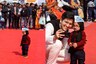Multiple Baby Mufflermen Turn Up at Kejriwal's Swearing-in, Raghav Chaddha Poses with Original