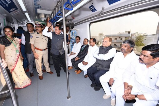 Telangana CM K Chandrashekhar Rao with his colleagues and senior officials take a ride in the new metro route. (Image credit: Twitter@MinisterKTR)