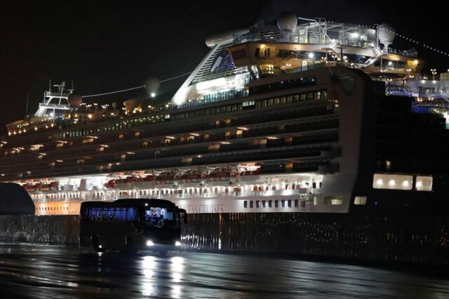 Buses believed to carry the US passengers of the cruise ship Diamond Princess leave at Daikoku Pier Cruise Terminal in Yokohama, south of Tokyo, Japan. (Reuters)