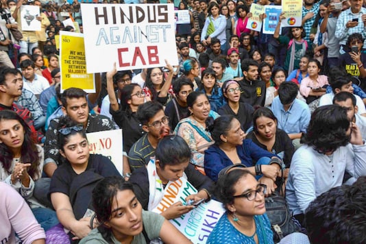Students display placards and raise slogans during a protest against the Citizenship Amendment Act, outside Mumbai University Gate. (PTI) Students display placards and raise slogans during a protest against the Citizenship Amendment Act, outside Mumbai University Gate. (PTI)
