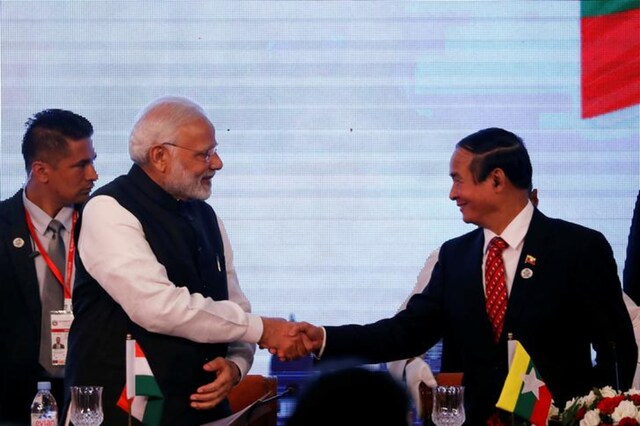 Prime Minister Narendra Modi shakes hands with Myanmar's president Win Myint during the Bay of Bengal Initiative for Multi-Sectoral Technical and Economic Cooperation (BIMSTEC) summit in Kathmandu, Nepal August 30, 2018. (Reuters)