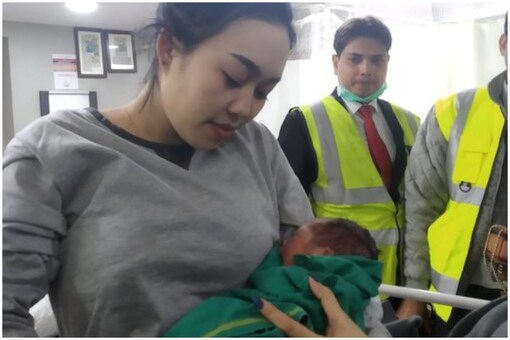 the 22-year-old woman was flying from doha to Bangkok when she went into labour in the flight | Image credit: Twitter