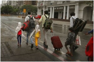 Bracing Rain & Dust Storm Stranded Migrants Continue Their Trek