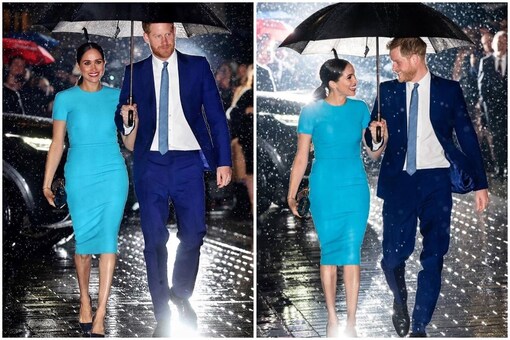 Harry and Meghan sharing an umbrella in the rain | Image credit: Twitter
