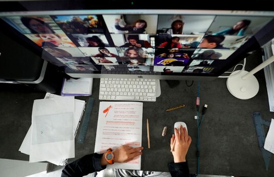 A student takes classes online with his companions using the Zoom app at home during the coronavirus disease (COVID-19) outbreak (Image: Reuters)