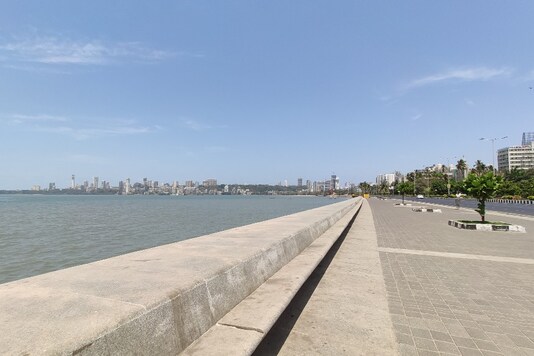 The vast, empty stretch continues for miles across Marine Drive. The city remains under careful watch through regular blockades inspecting possible trespassers of the rule.