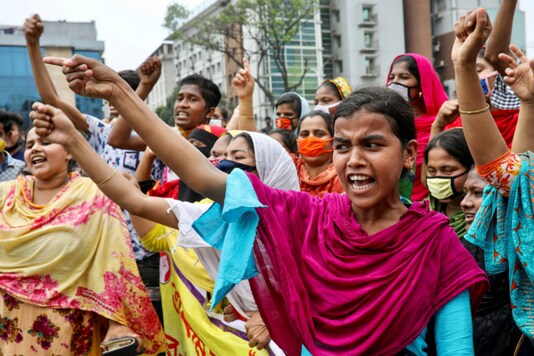 File photo of garments workers demanding their due wages during the lockdown amid concerns over the coronavirus disease (COVID-19) outbreak in Dhaka, Bangladesh.

(REUTERS)